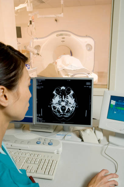 istock Chinese technician checking MRI results in hospital 1035221934