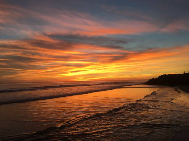 istock Orange sunset over an orange sea 1035222146