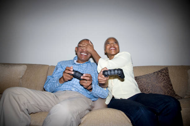 istock African couple playing video game 1035222344