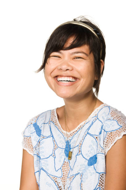istock Asian woman smiling at camera 1035231868