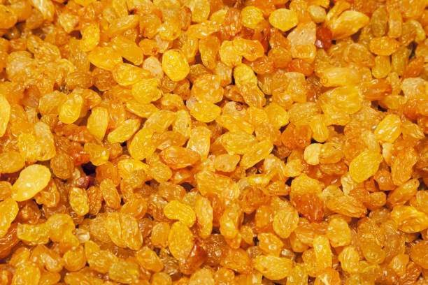 istock Sweet yellow raisins ingredient close-up background 1035256042
