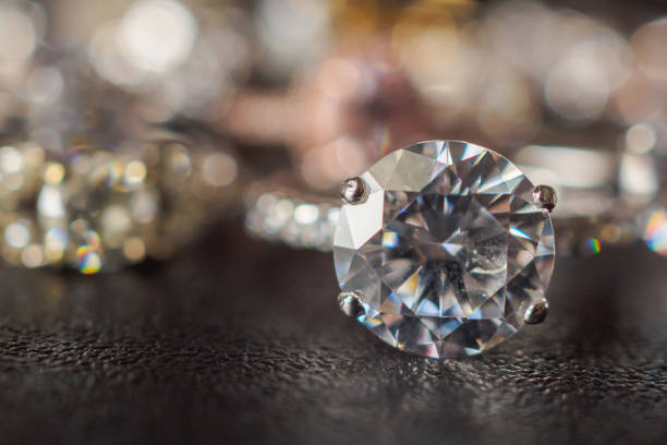 istock Jewelry diamond rings set on black background close up 1035265296