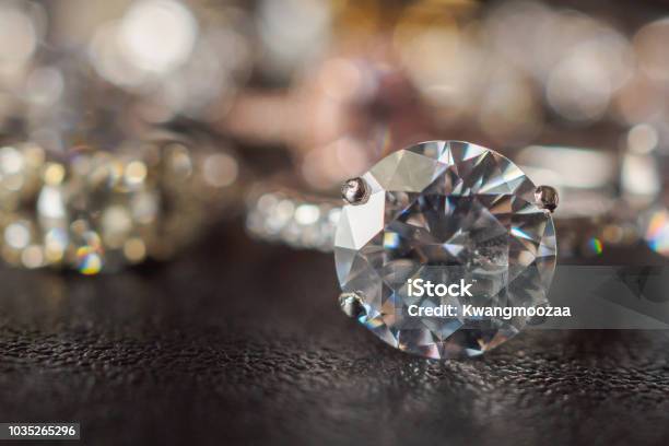 Jewelry Diamond Rings Set On Black Background Close Up Stock Photo - Download Image Now