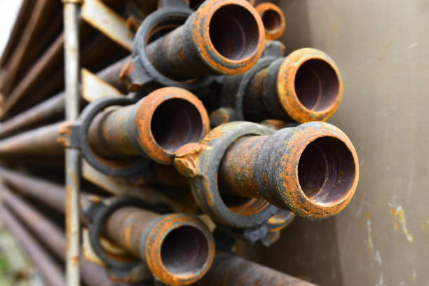 istock Old Rusted Industrial Pipes Background 1035278272