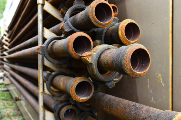 istock Old Rusted Industrial Pipes Background 1035278424