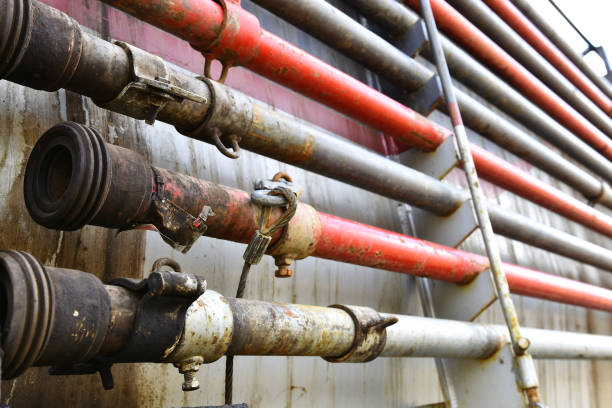 istock Old Rusted Industrial Pipes Background 1035280284