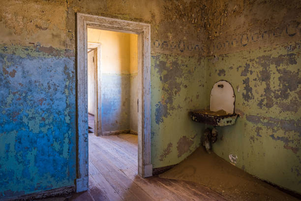 istock Abandoned ghost town of Kolmanskop in Namibia 1035299188