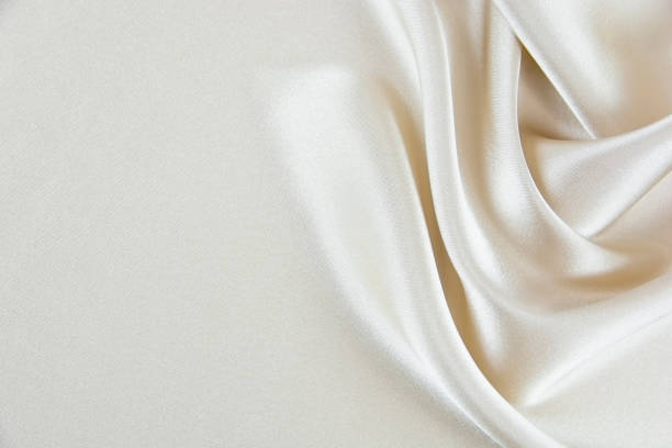 istock Texture satin fabric beige,Golden color for the background 1035299824