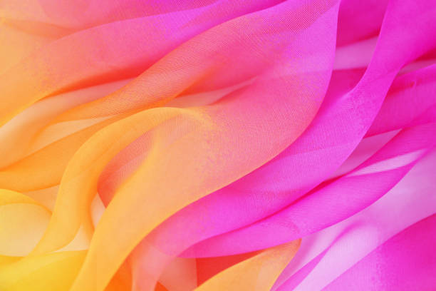istock Texture chiffon fabric pink and yellow  color for backgrounds 1035305346