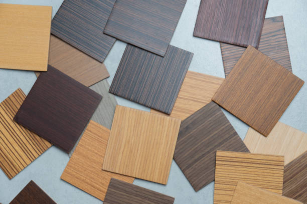 istock samples of material, wood , on concrete table.Interior design select material for idea. 1035307894