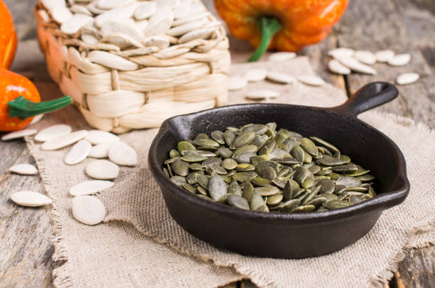 istock Pumpkin seeds in a pan 1035319804