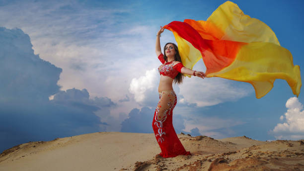 istock Asian Beauty belly dancing outdoors 1035322400