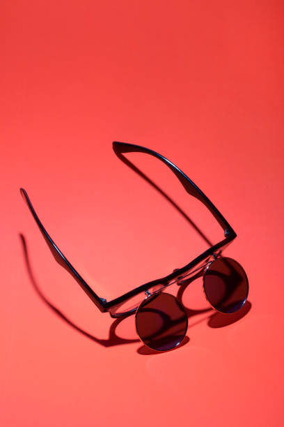 istock Sunglasses with double glass on a pink background 1035325850