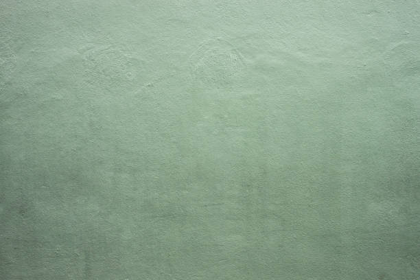 istock Surface of green cement wall. 1035331018