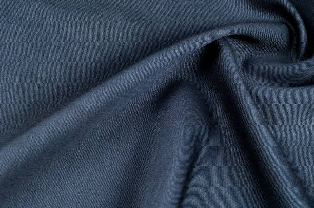 istock Background texture, pattern. cloth wool suit gray. A genuine flannel is always made of carded yarn, carded flannel is ideal in the cold months of the year, it is heavy, cozy and soft. 1035347296