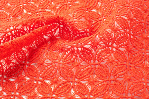 istock Image texture background, Detail of woven woolen texture of design and lace. Red fabric background. Decorative lace with a pattern. Red texture of lace fabric Photo taken in studio 1035347324
