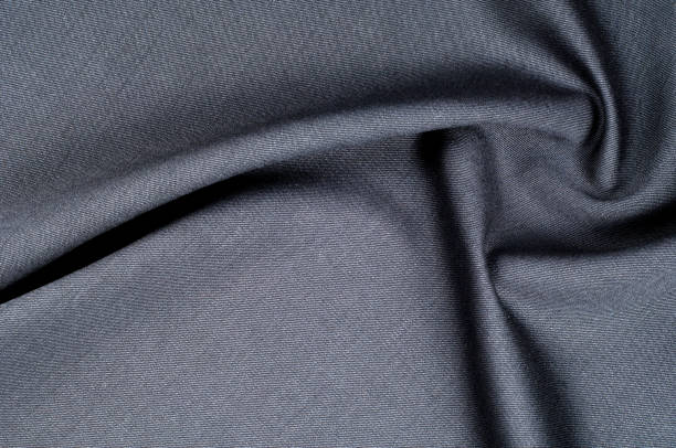 istock Background texture, pattern. cloth wool suit gray. A genuine flannel is always made of carded yarn, carded flannel is ideal in the cold months of the year, it is heavy, cozy and soft. 1035347372