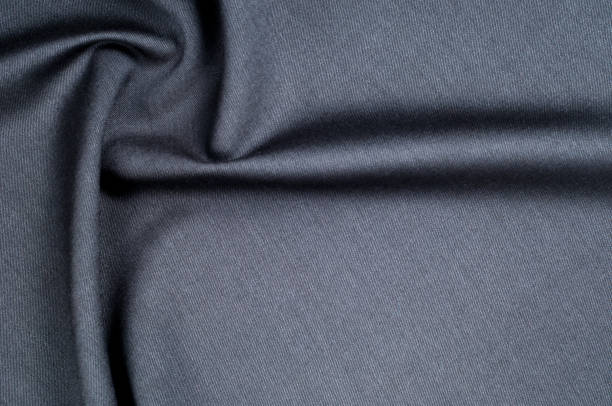 istock Background texture, pattern. cloth wool suit gray. A genuine flannel is always made of carded yarn, carded flannel is ideal in the cold months of the year, it is heavy, cozy and soft. 1035347388