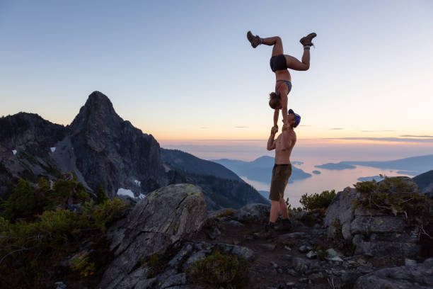 Acro Yoga on top of a Mountain