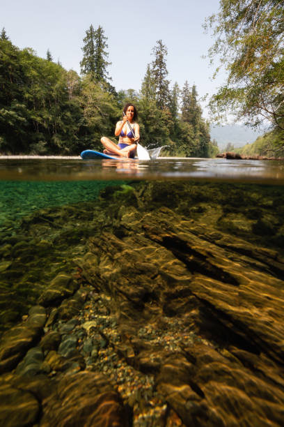 istock Girl Paddling in a River 1035347846