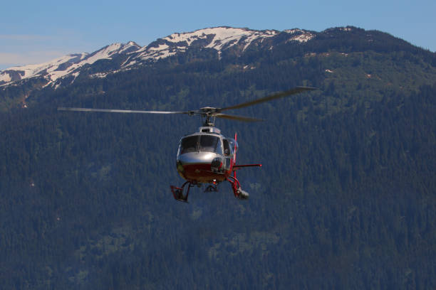 istock Helicopter in high mountains 1035350826