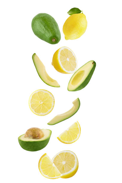 istock Falling lemon and avocado isolated on white background 1035355630