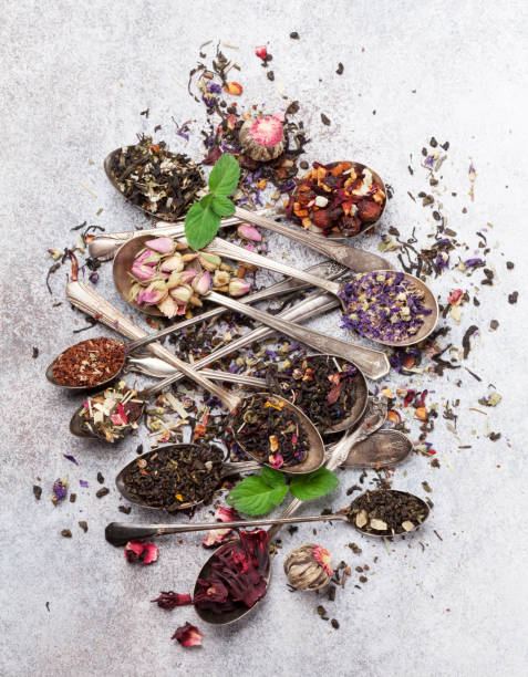 istock Various tea in spoons. Black, green and red tea 1035365392