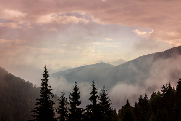 istock Mountain scenery in the Transylvanian Alps in autumn, with mist clouds 1035365468