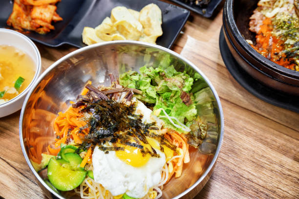 istock Bibimbap is a popular Korean dish. Mixed rice with meat 1035383426