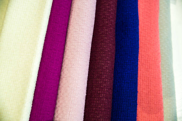 istock A multicolored stack of fabrics - the fabrics lie on top of each other 1035390176