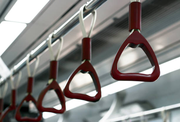 istock close-up handles in subway train 1035393112