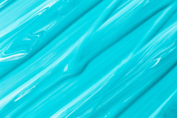 istock Liquid blue paint background of texture 1035393142