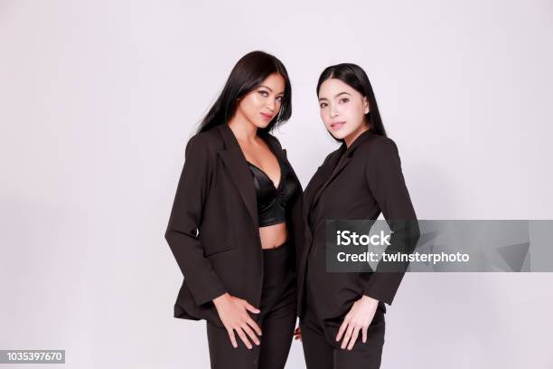 Casual Shy Man In A Black Suit Jacket And Jeans Stock Photo - Download Image Now - Adult, Adults Only, Backgrounds - iStock