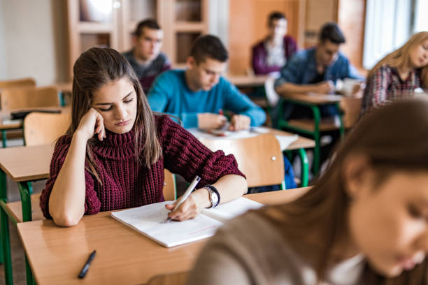 istock Bored high school student during a class in the classroom. 1035400262