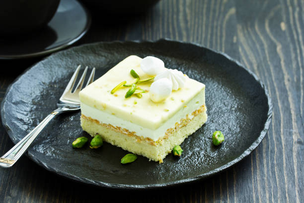 istock piece of pistachio cake mousse. 1035404340