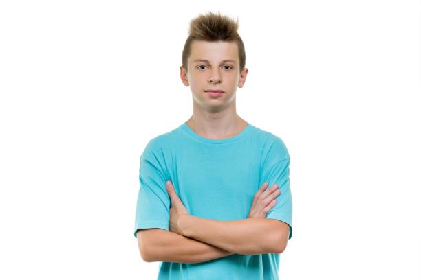 portrait de sourire le garçon adolescent 14, 15 ans, fond isolé blanc - 13 14 years teenager 14 15 years child photos et images de collection
