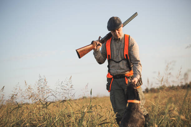 istock Hunter with hunting dog during a hunt 1035410722