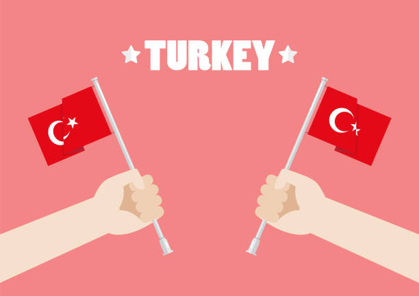 istock Republic Day of Turkey with Hands Holding Up Turkey Flags 1035421114