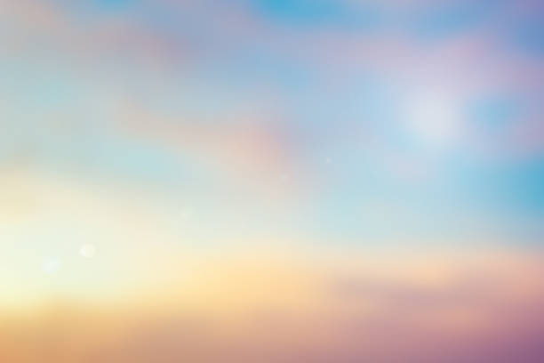 istock blurred beautiful natural pastel background lens ray flare flash light. 1035424314