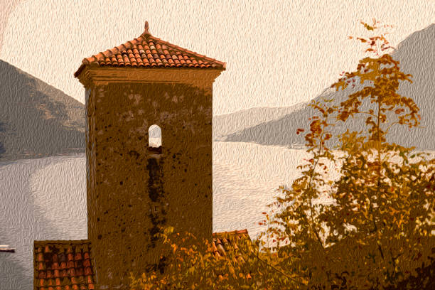 In the background of the church of Ancona sopra Ancona you can recognize lake Maggiore with the isle of Brissago. Located in Switzerland in the Canton of Tessin.