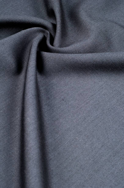 istock Background texture, pattern. cloth wool suit gray. A genuine flannel is always made of carded yarn, carded flannel is ideal in the cold months of the year, it is heavy, cozy and soft. 1035440166