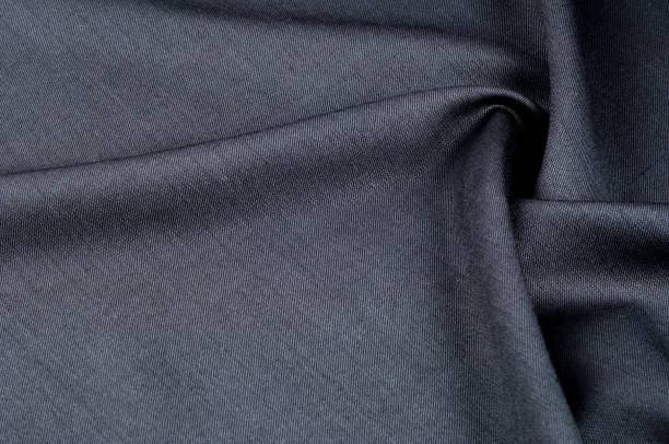 istock Background texture, pattern. cloth wool suit gray. A genuine flannel is always made of carded yarn, carded flannel is ideal in the cold months of the year, it is heavy, cozy and soft. 1035440350