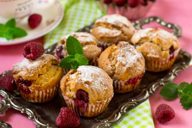 istock Sweet raspberry muffins for tea and dessert 1035448456