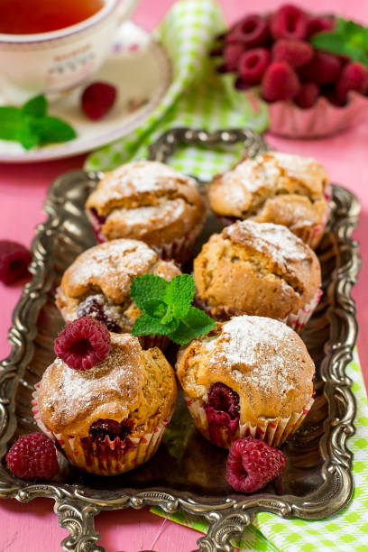 istock Sweet raspberry muffins for tea and dessert 1035448488