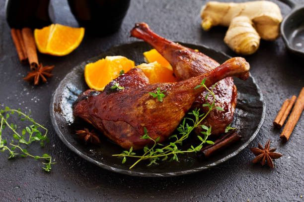 Baked duck leg in Chinese. Baked duck leg in Chinese. confit stock pictures, royalty-free photos & images