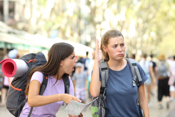 istock Angry backpackers arguing during vacation travel 1035452414