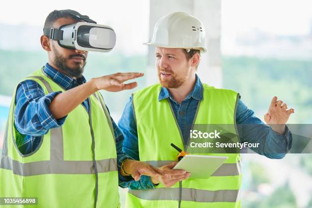 Using Vr Simulator For Building Visualization Stock Photo - Download Image Now - Virtual Reality Simulator, Virtual Reality, Construction Industry