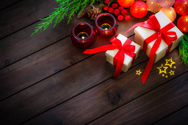 istock Two Christmas presents on rustic wooden table shot from above 1035456922