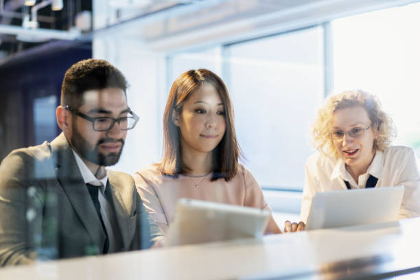 istock International business people talking about a new project 1035457116