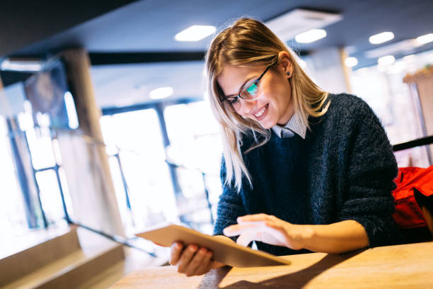 istock Portrait of young attractive woman using tablet 1035468136